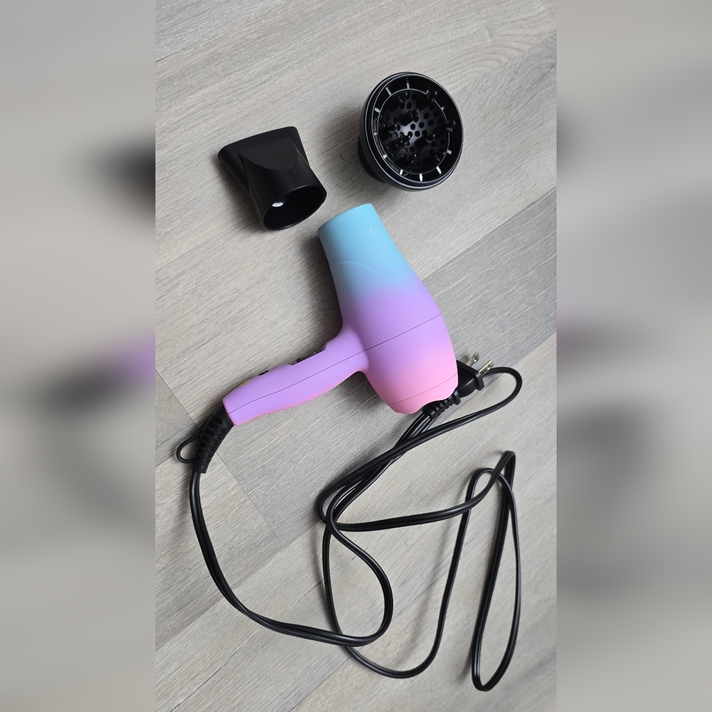 Relaxus Beauty Unicorn Mini Travel Blow Dryer in the ombré unicorn colorway. 